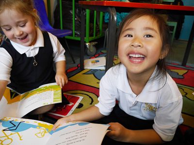Children Smiling with Books